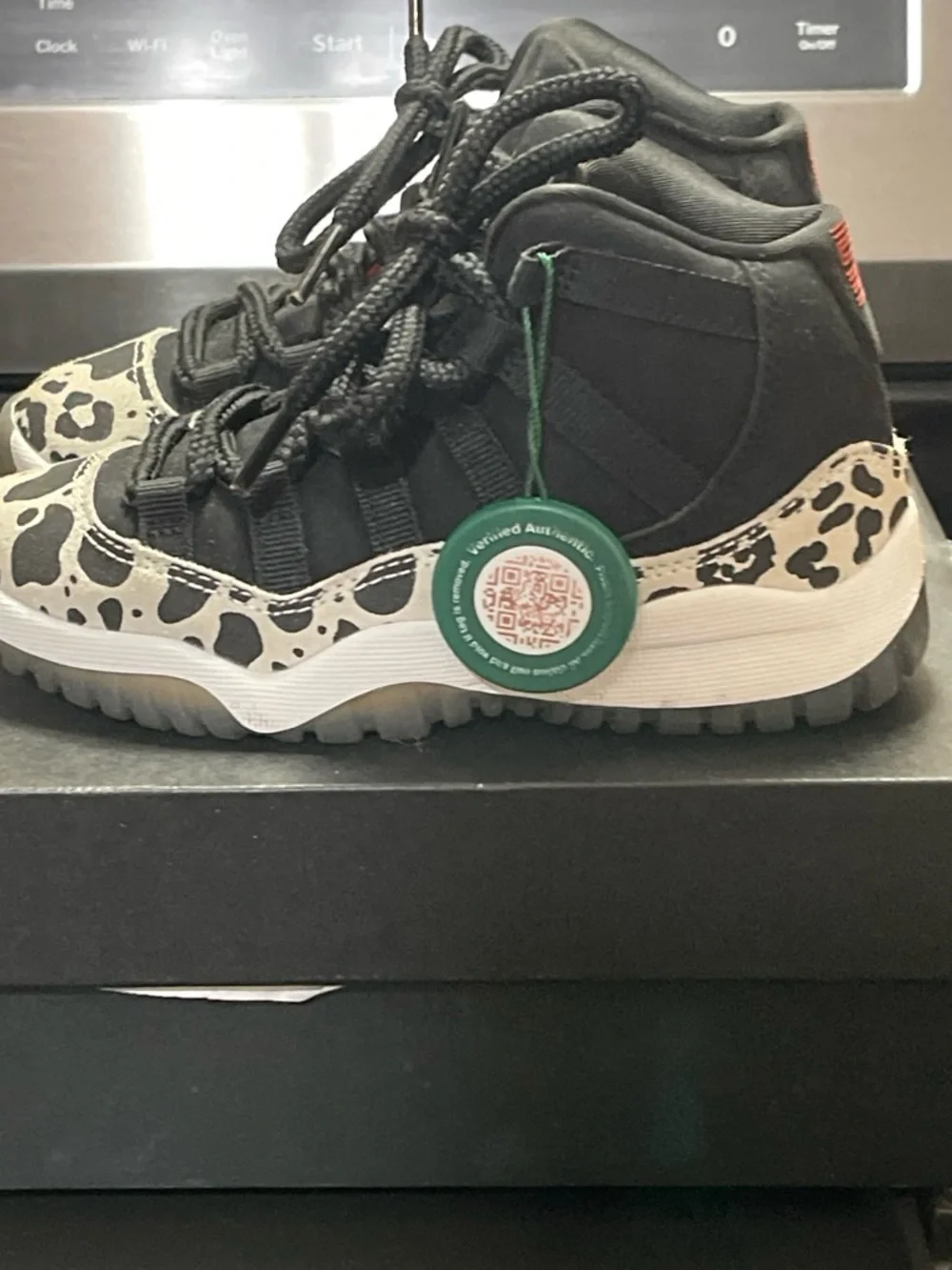 Jordan Kids High-Top Sneakers in Black and Cream Leopard